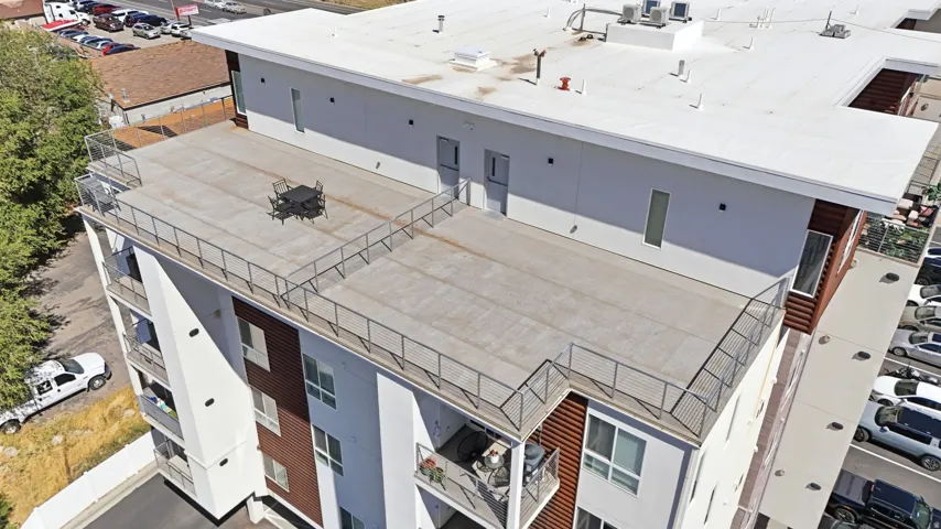 Expansive rooftop terrace with protective railing