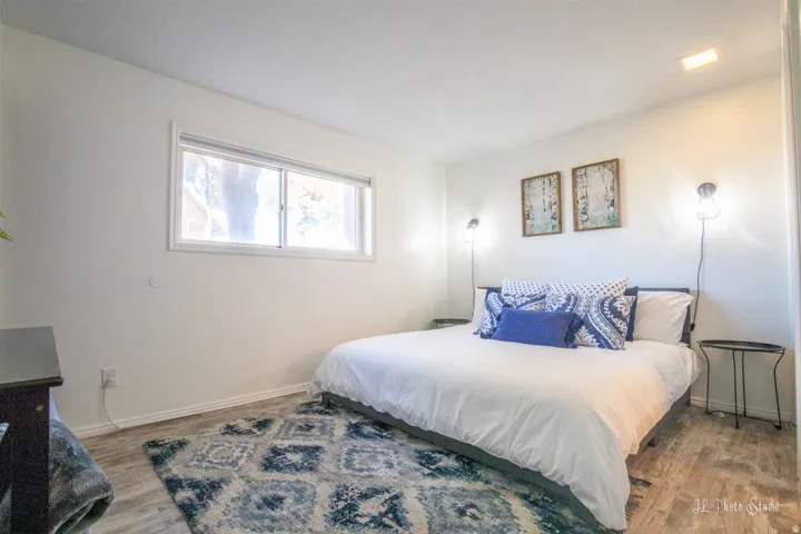 Wood-finish flooring with white walls