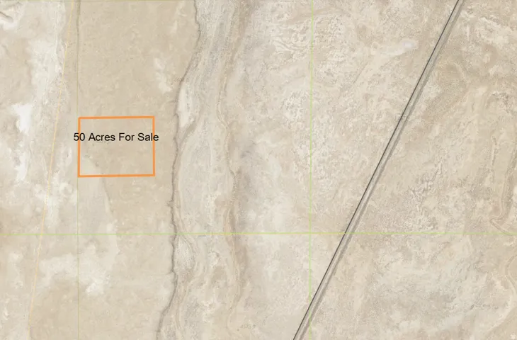 Aerial Map. Indicating a 50-acre property for sale with a road visible