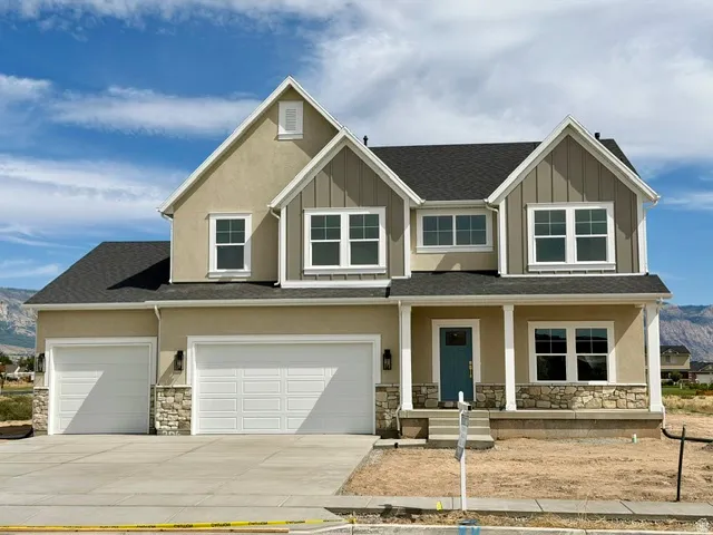 Contemporary two-story residence with a stucco and board and batten exterior
