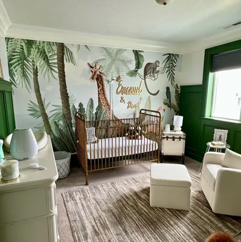 Accent wall featuring a jungle-themed mural