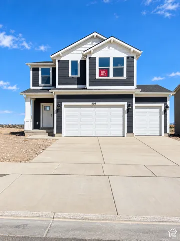 Two-story exterior with horizontal siding and white trim accents