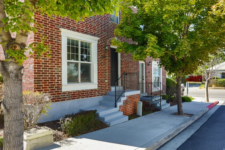 Brick exterior with white window trim