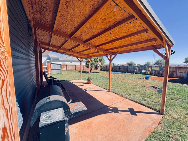 Large covered patio - south Facing - lots of summer shade for BBQ
