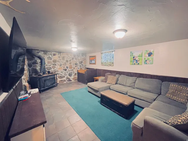 Downstairs family room with huge fireplace