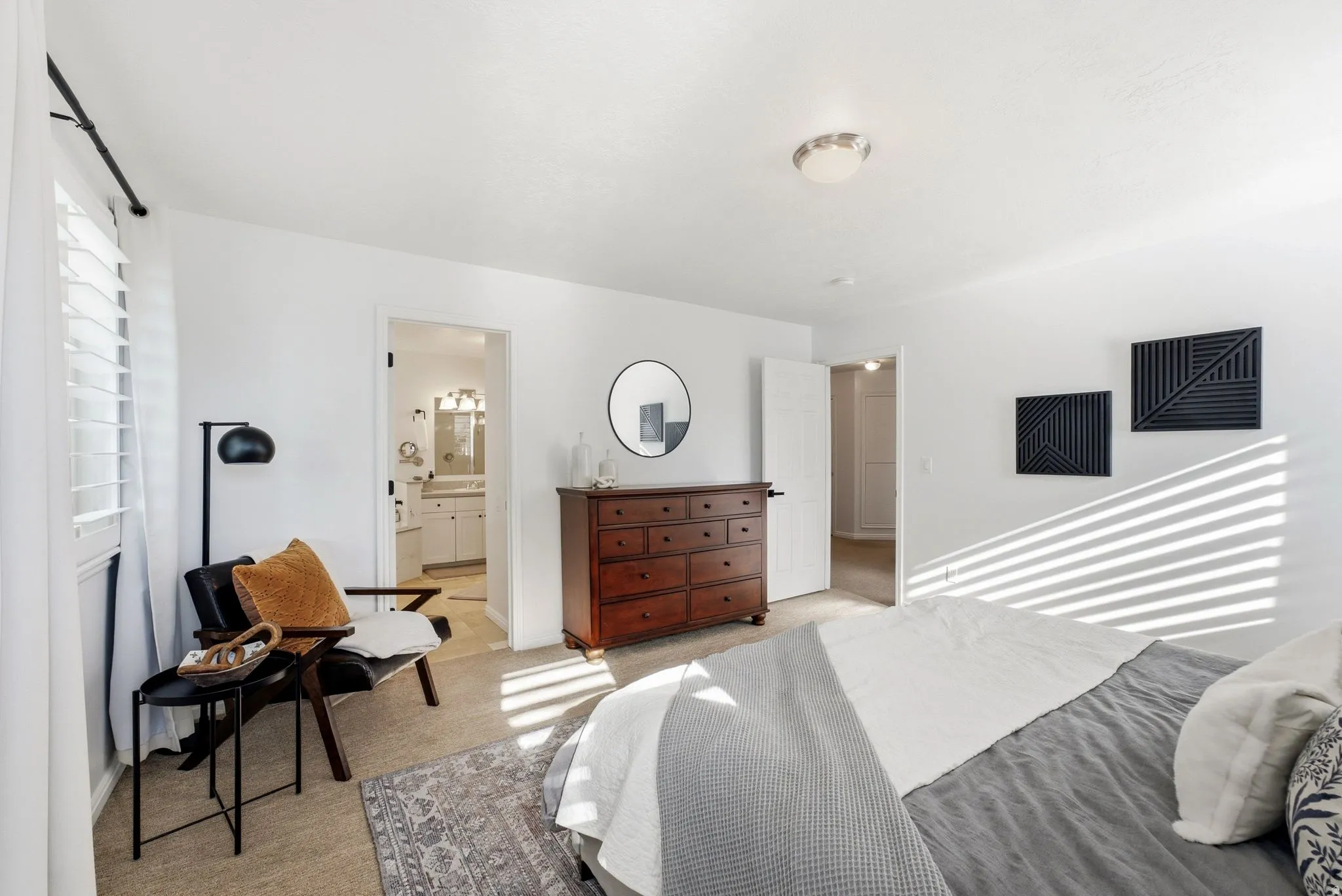 White walls with a light-colored carpet