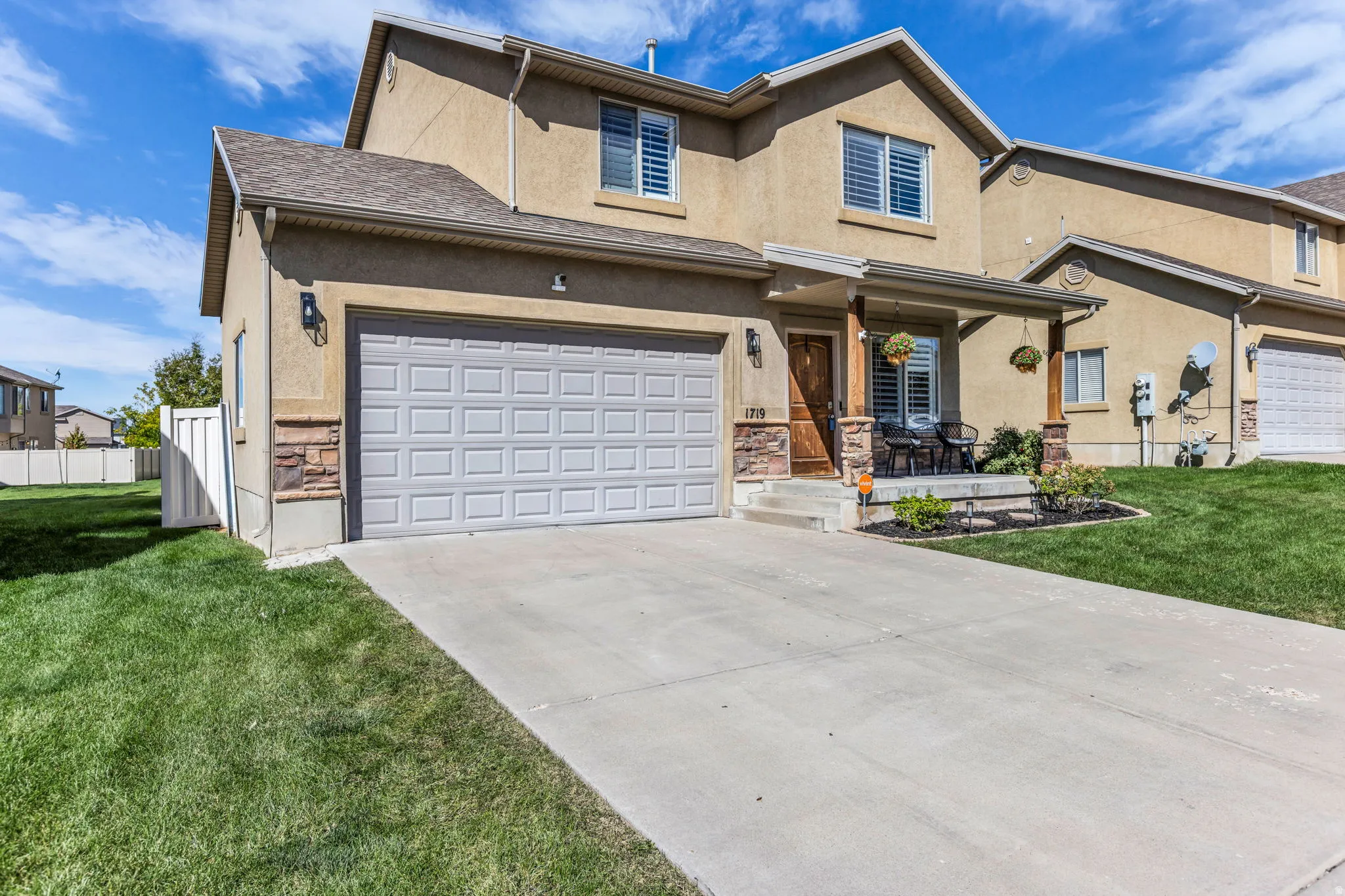 2 car garage, covered patio, HOA mows the front lawn
