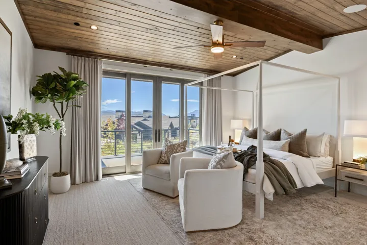 Wood-finish plank ceiling with exposed beams, ceiling fan, and recessed lighting
