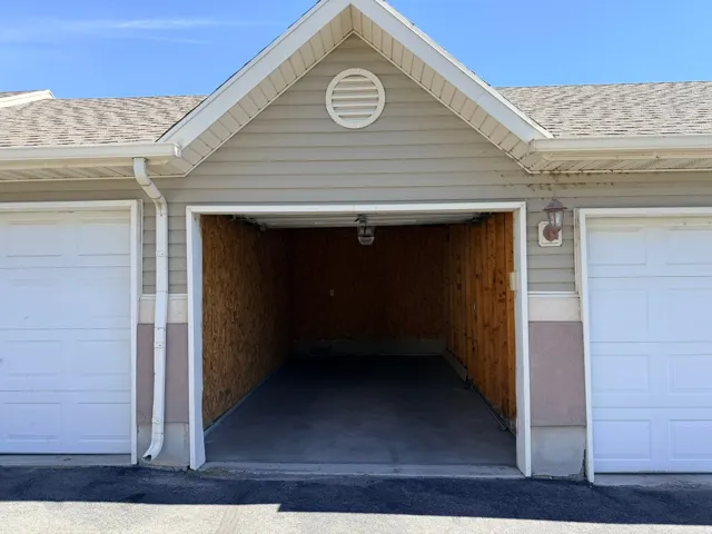 One car garage plus one assigned parking spot