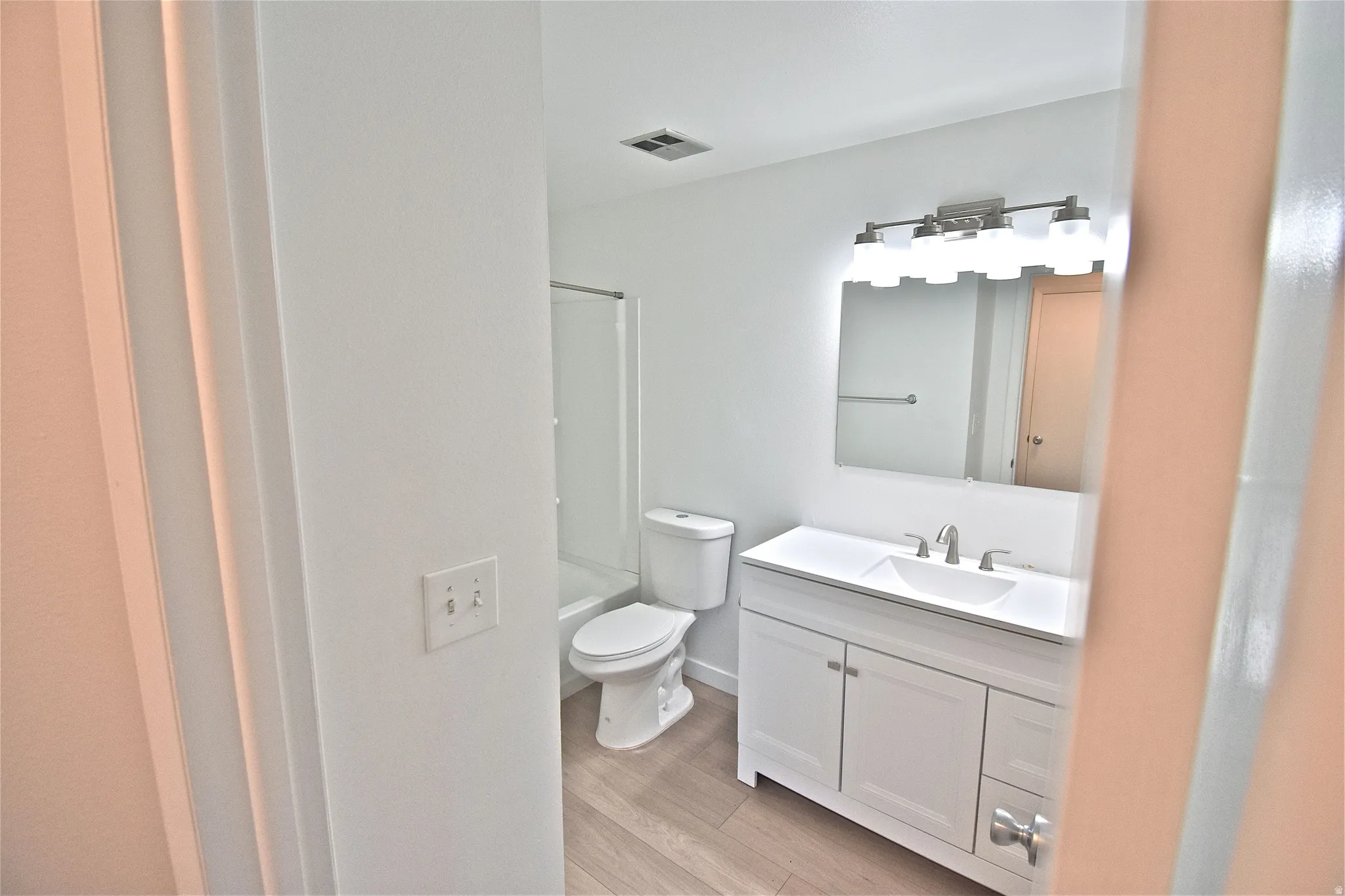 Upstairs full bath with new vanity, fixtures and lighting