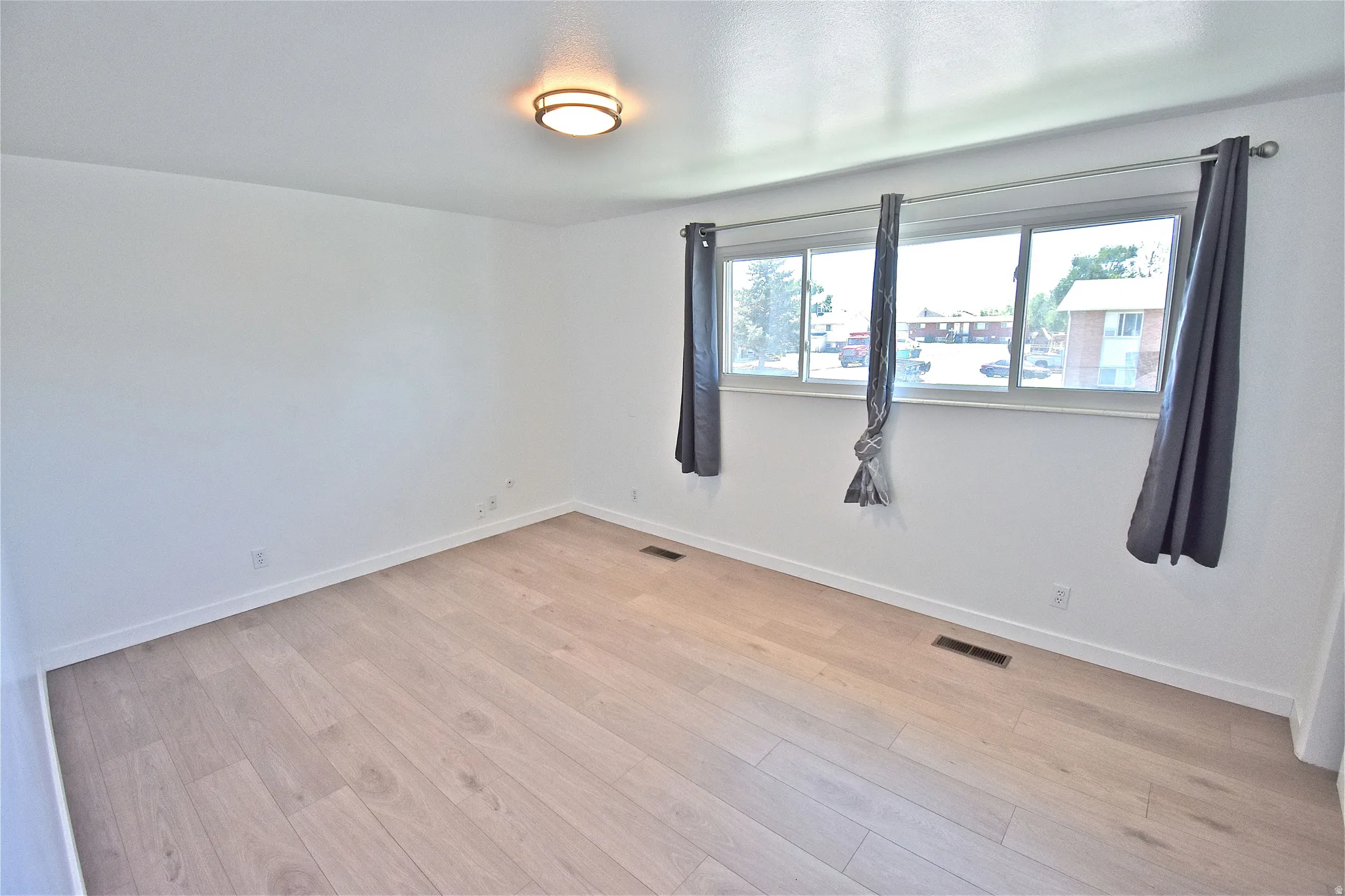 Upstairs bedroom with blackout window coverings