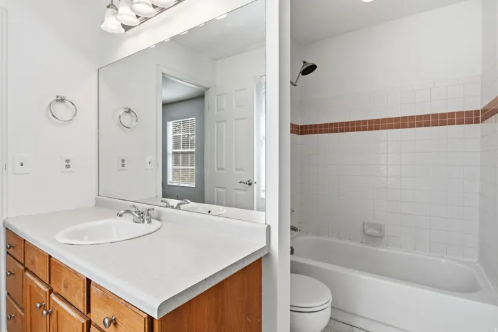 Full vanity mirror with overhead vanity lighting