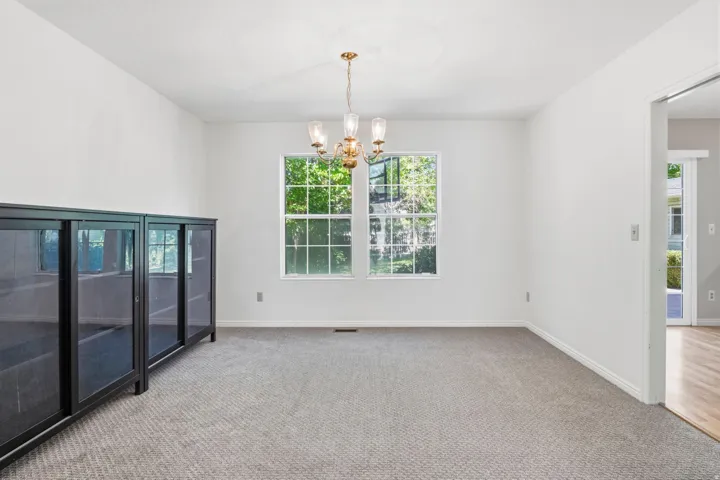 Neutral wall finishes, recessed window, and a built-in light fixture