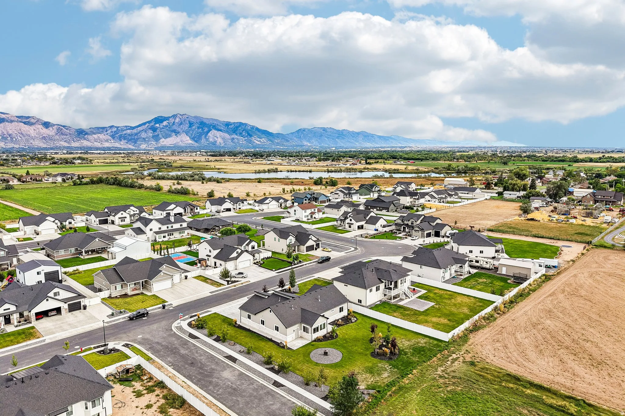 New construction residential community featuring paved streets and established homes