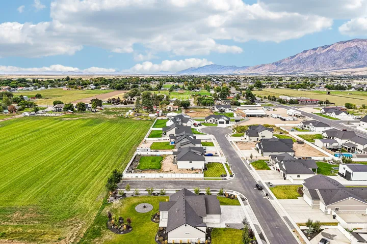 Residential neighborhood featuring newly constructed homes, paved streets, and landscaped yards