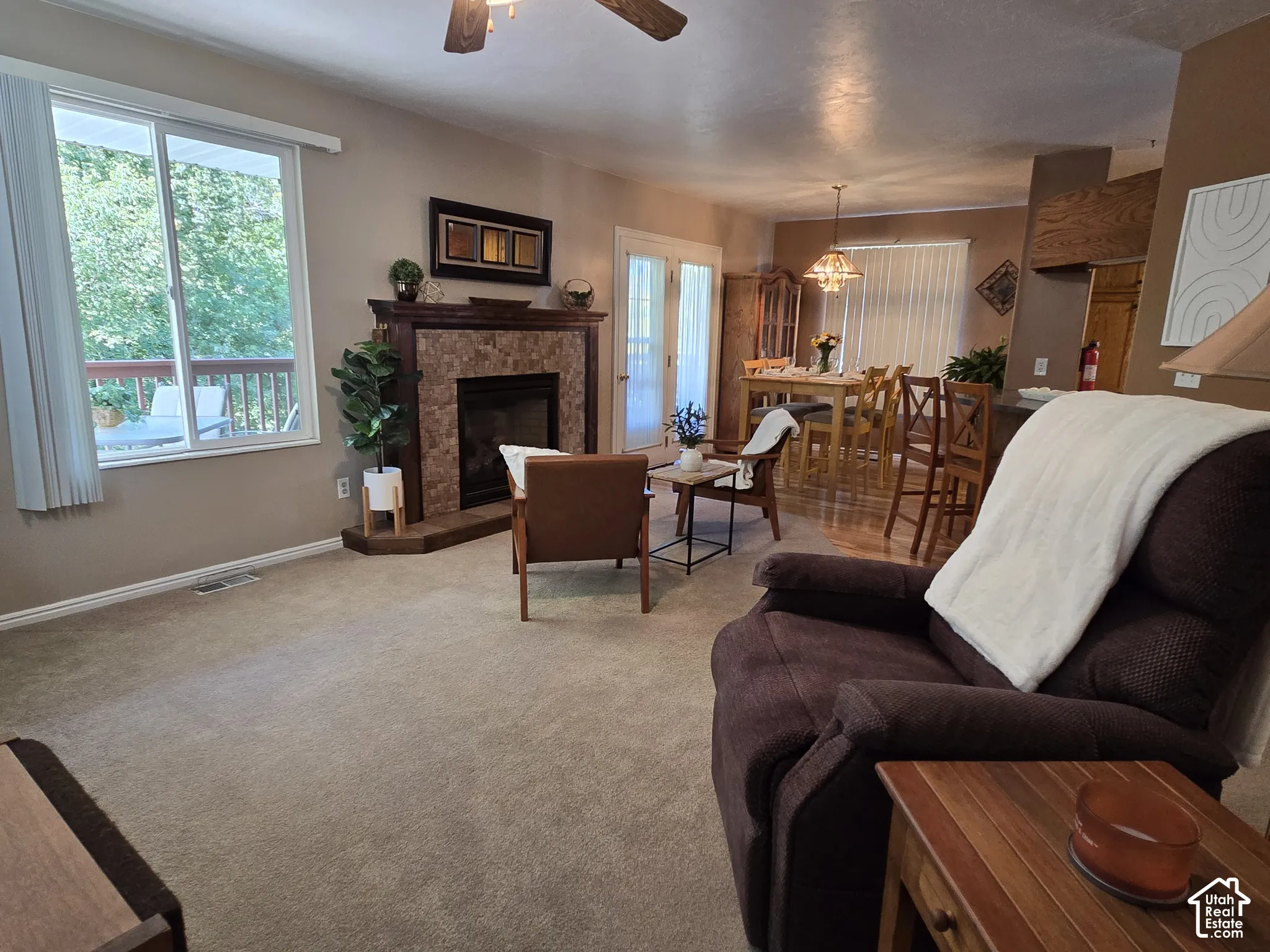 A fabulous open living area leading out to the west porch area and the dining room.