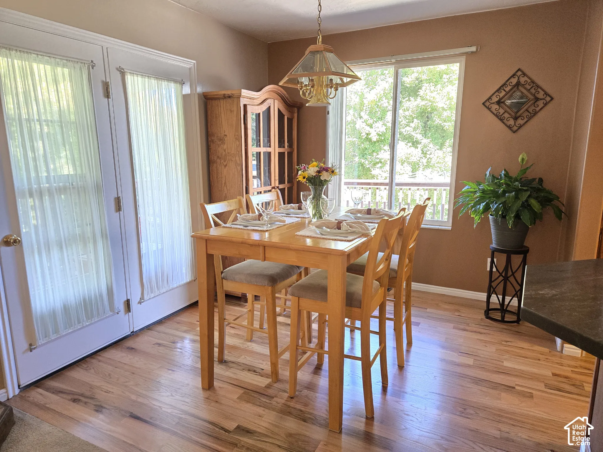 Hardwood flooring in excellent condition throughout, recessed French doors and a large picture window.