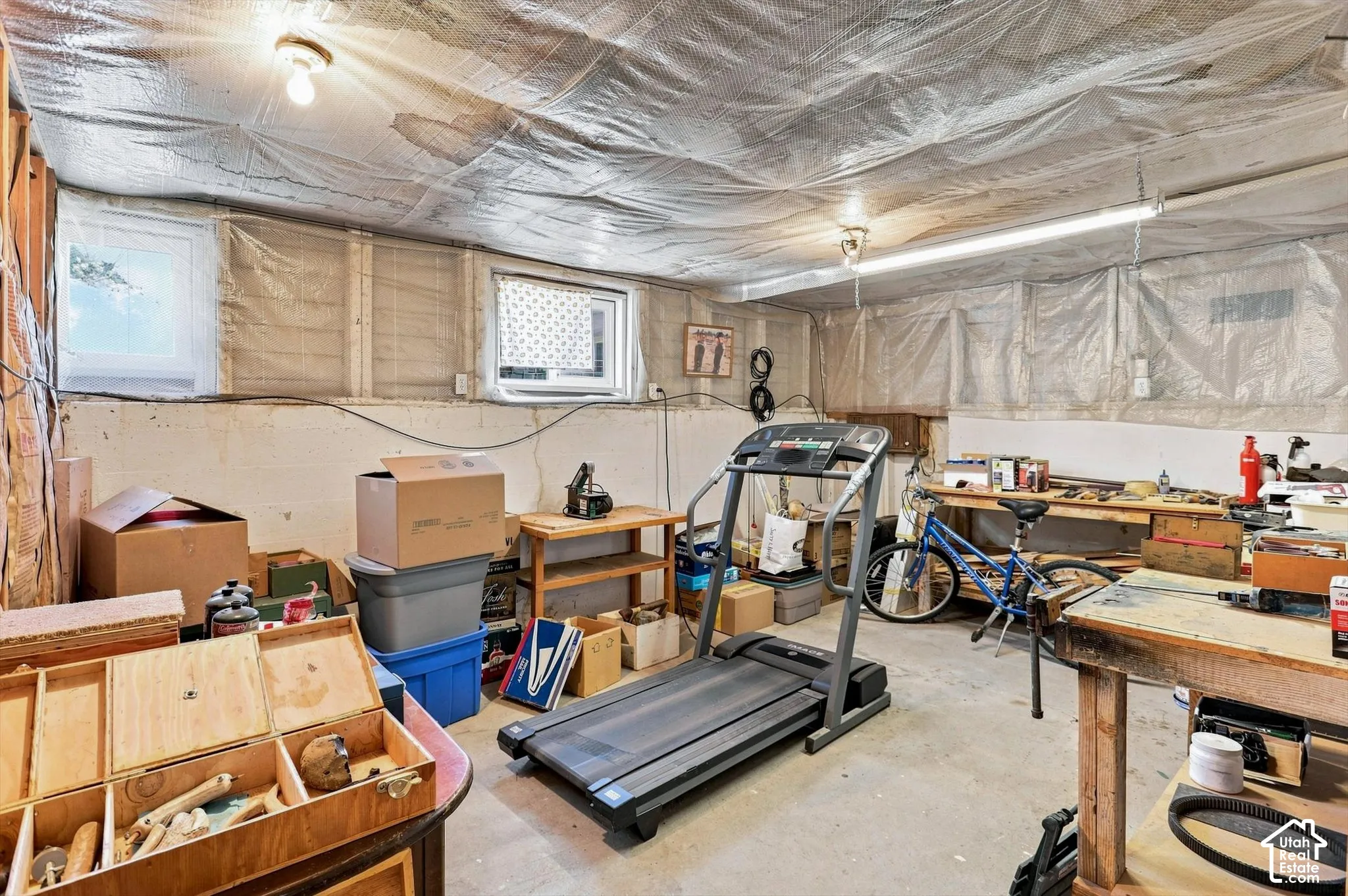 Several storage rooms below the loft for storage or supplies, a workshop, business activities, just needs some finish work.