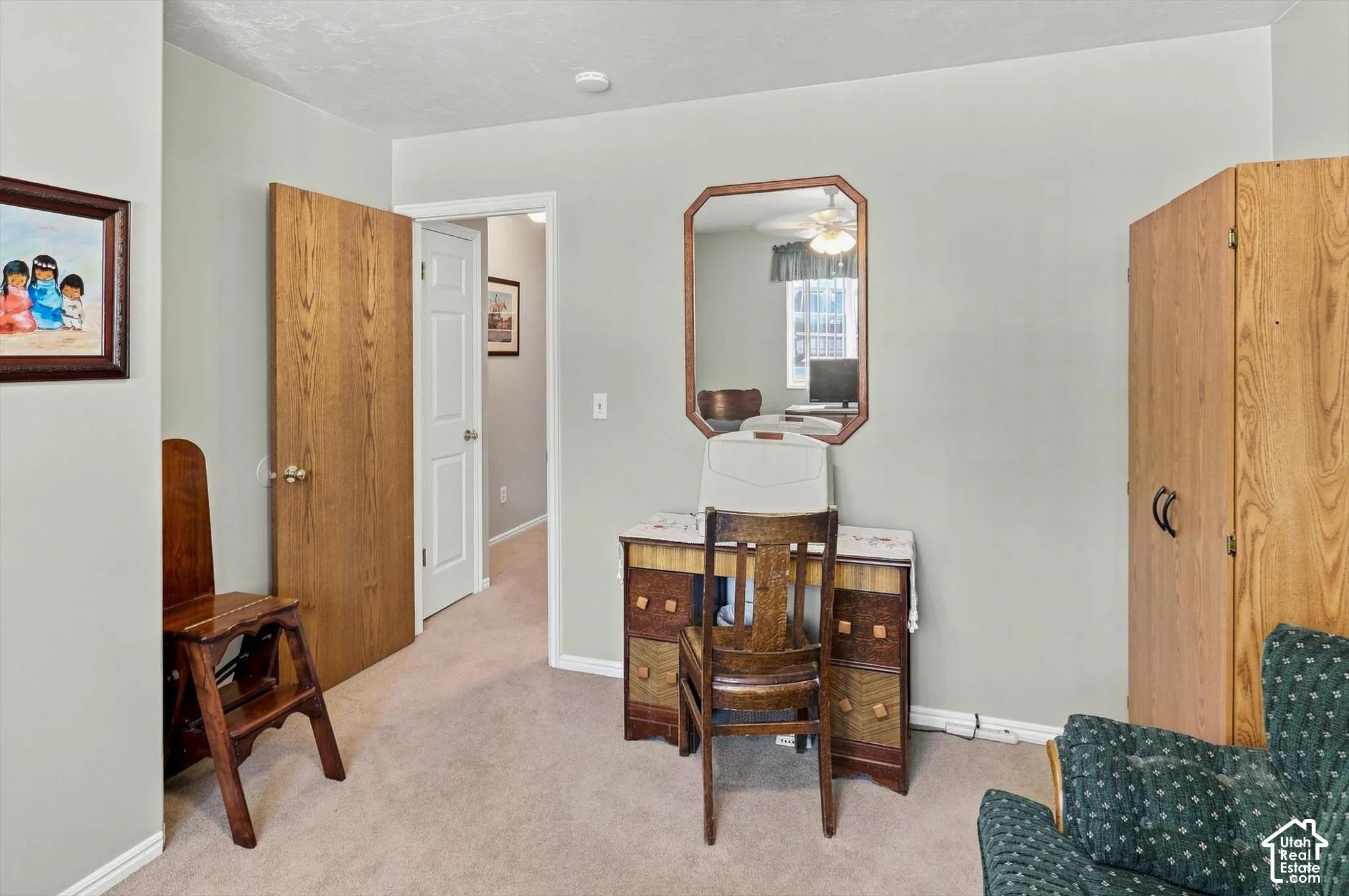 Light grey wall paint with carpet flooring