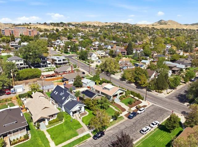 Neighborhood setting with mature trees and established residences