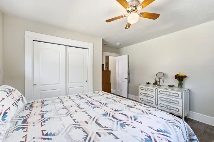 Wood-finish flooring with white trim and neutral wall tones