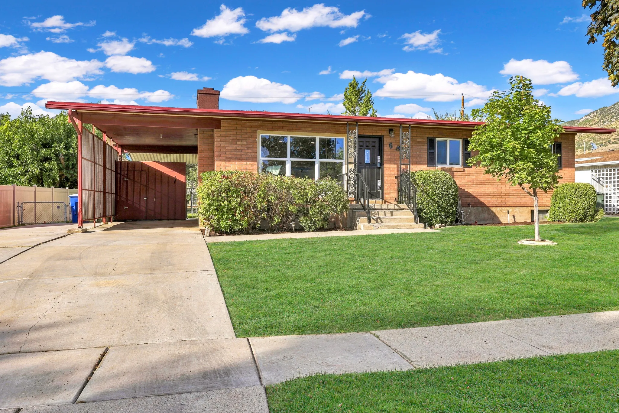 Charming rambler featuring low maintenance brick, brand new shutters and unpdated windows