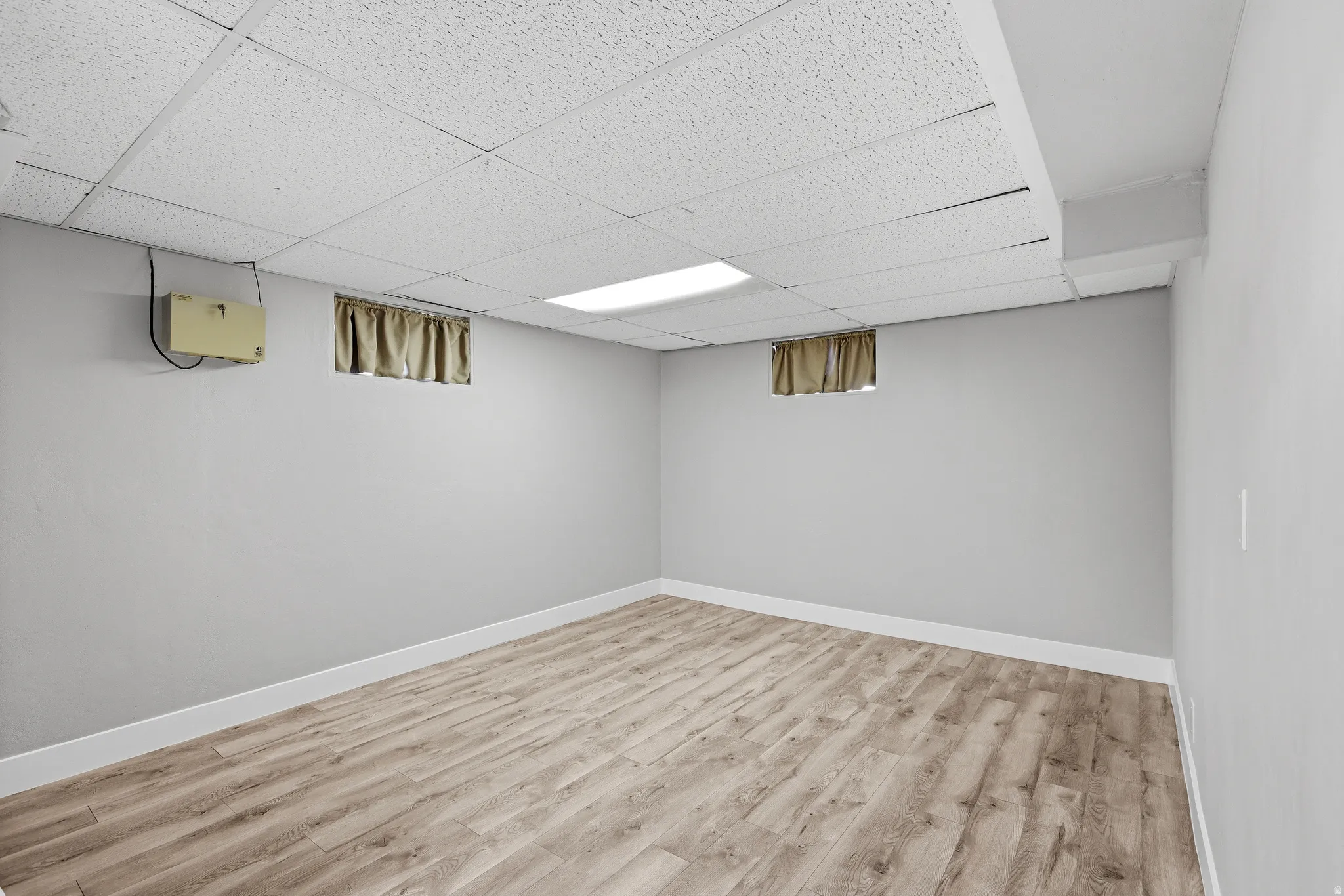 Additional lower level family room which could be another family room or converted to a 6th bedroom if desired.