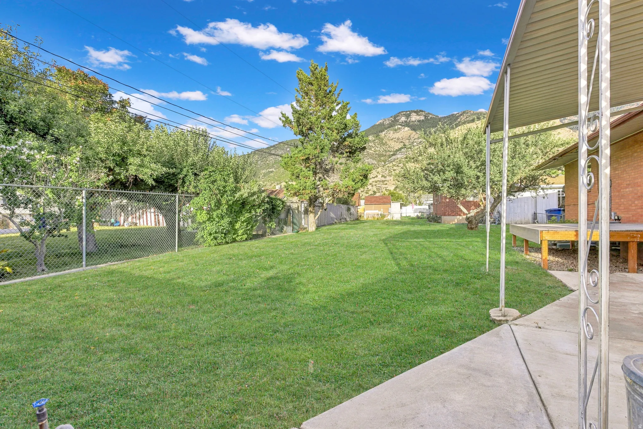 Mountain views from you flat and welcoming backyard (photo taken before deck was finished)