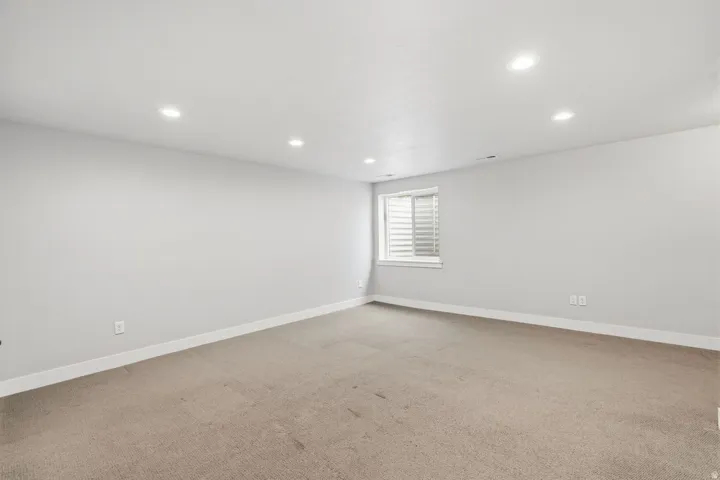 Recessed ceiling lighting with a window featuring horizontal blinds