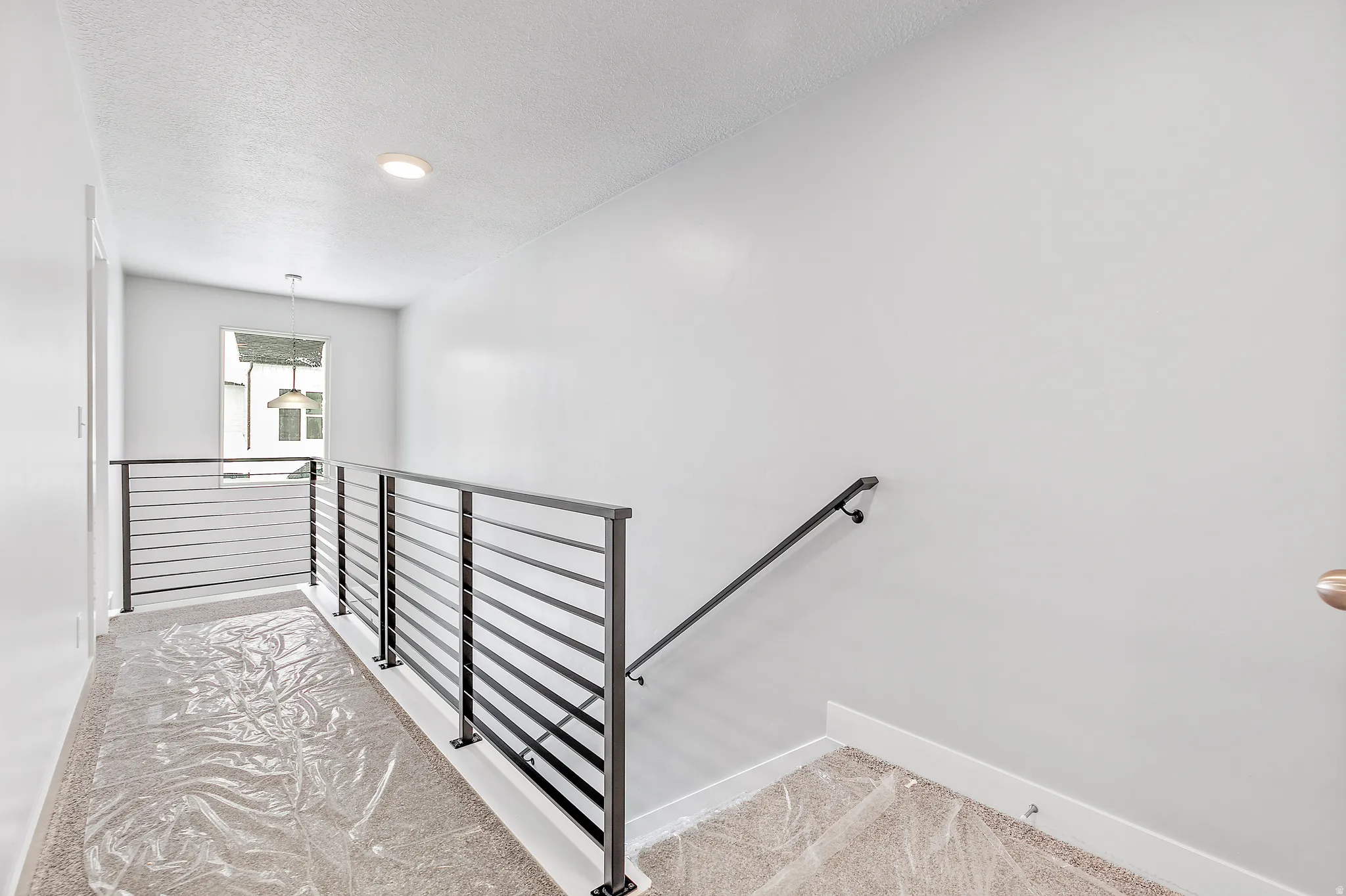 Contemporary metal railing with horizontal bars