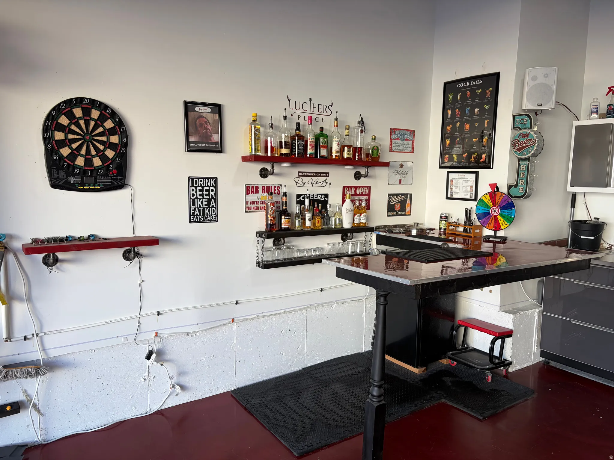 Garage by Day.  Party by Night!  Flip Up Convertible Bar, Mini Fridge, Pac Man Video Arcade Game, 60" TV, Dart Board, Removable Dance/Fitness Pole, Custom Flip Up Bench Seating, Lights, Speakers, Storage Cabinets and Decor, plus an EV Plug and Mounted Ret