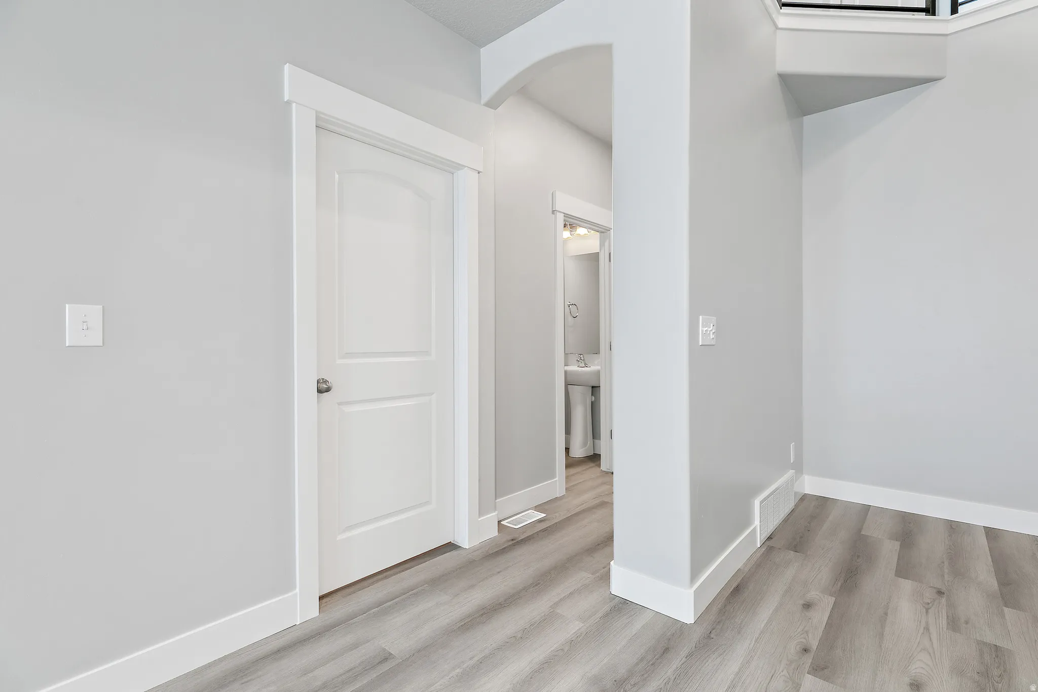 Wood-finish flooring throughout