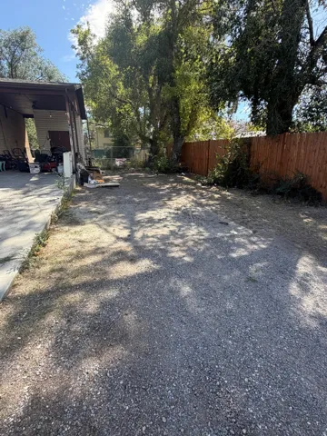 Additional parking next to carport and driveway.