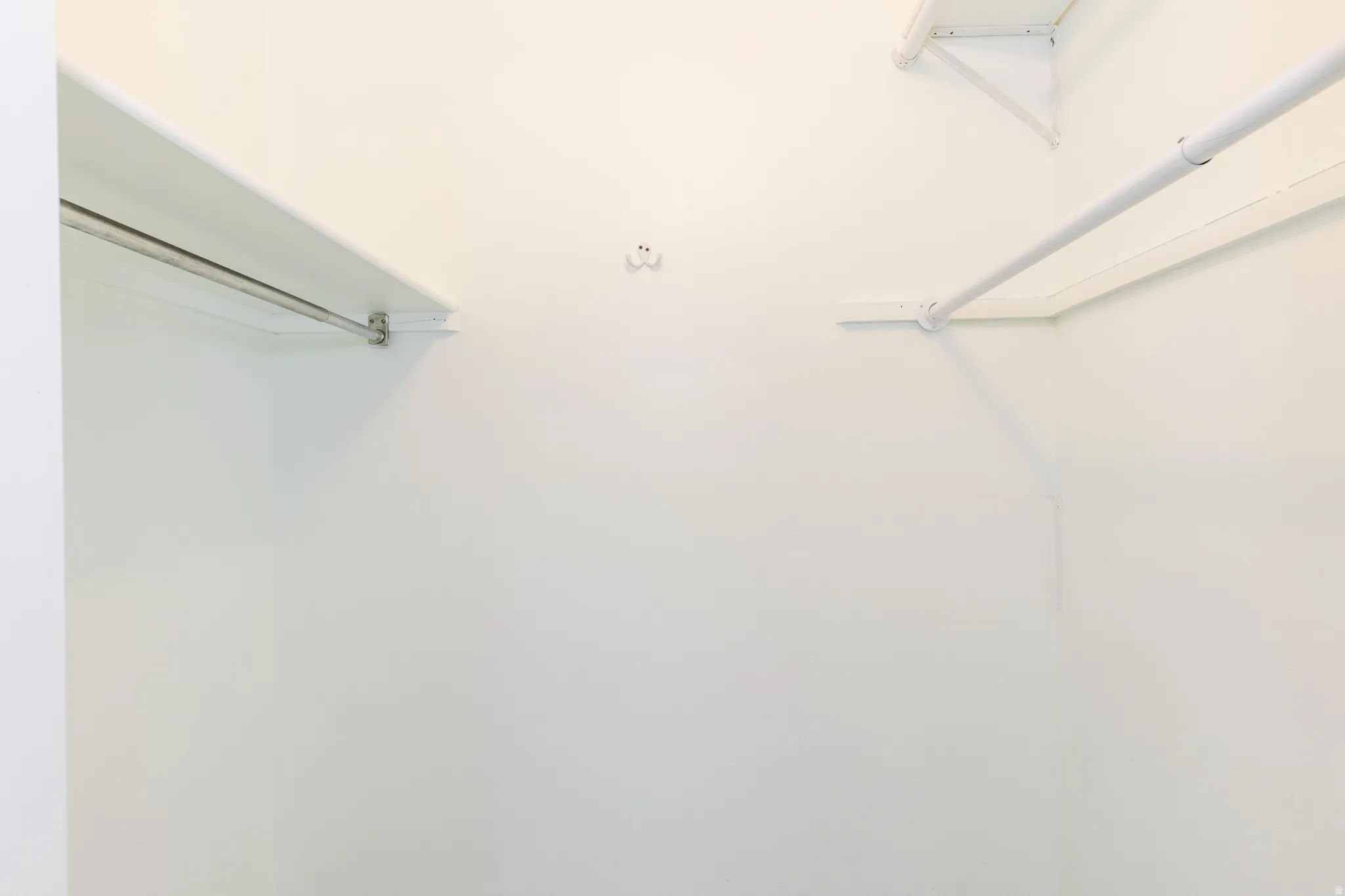 Built-in closet shelving and hanging rods