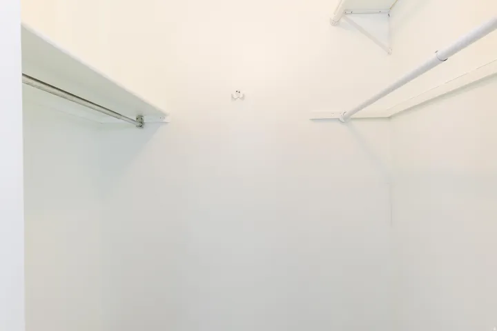Built-in closet shelving and hanging rods