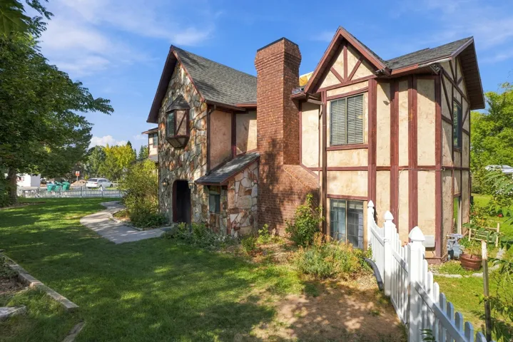 Stone and stucco exterior with exposed timber framing