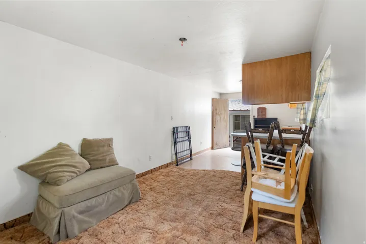 Bonus room off of the back of the detached garage. No heat or AC.