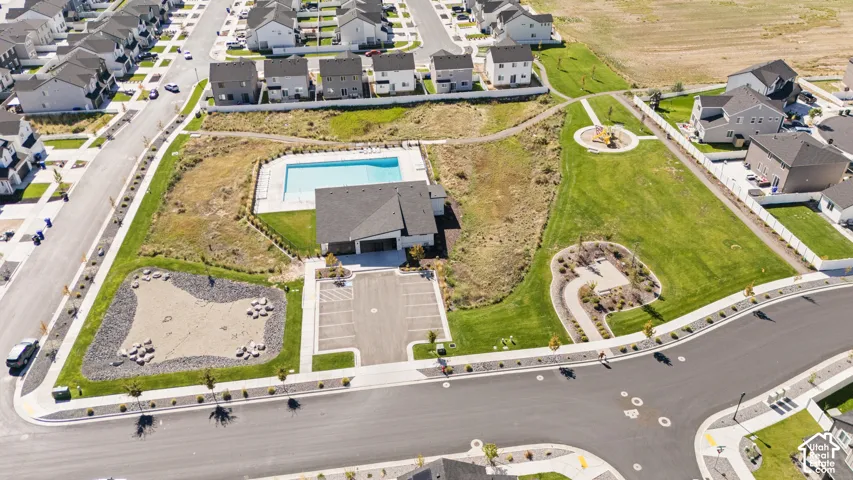 Community amenities include a swimming pool, clubhouse, playground, and paved pathways