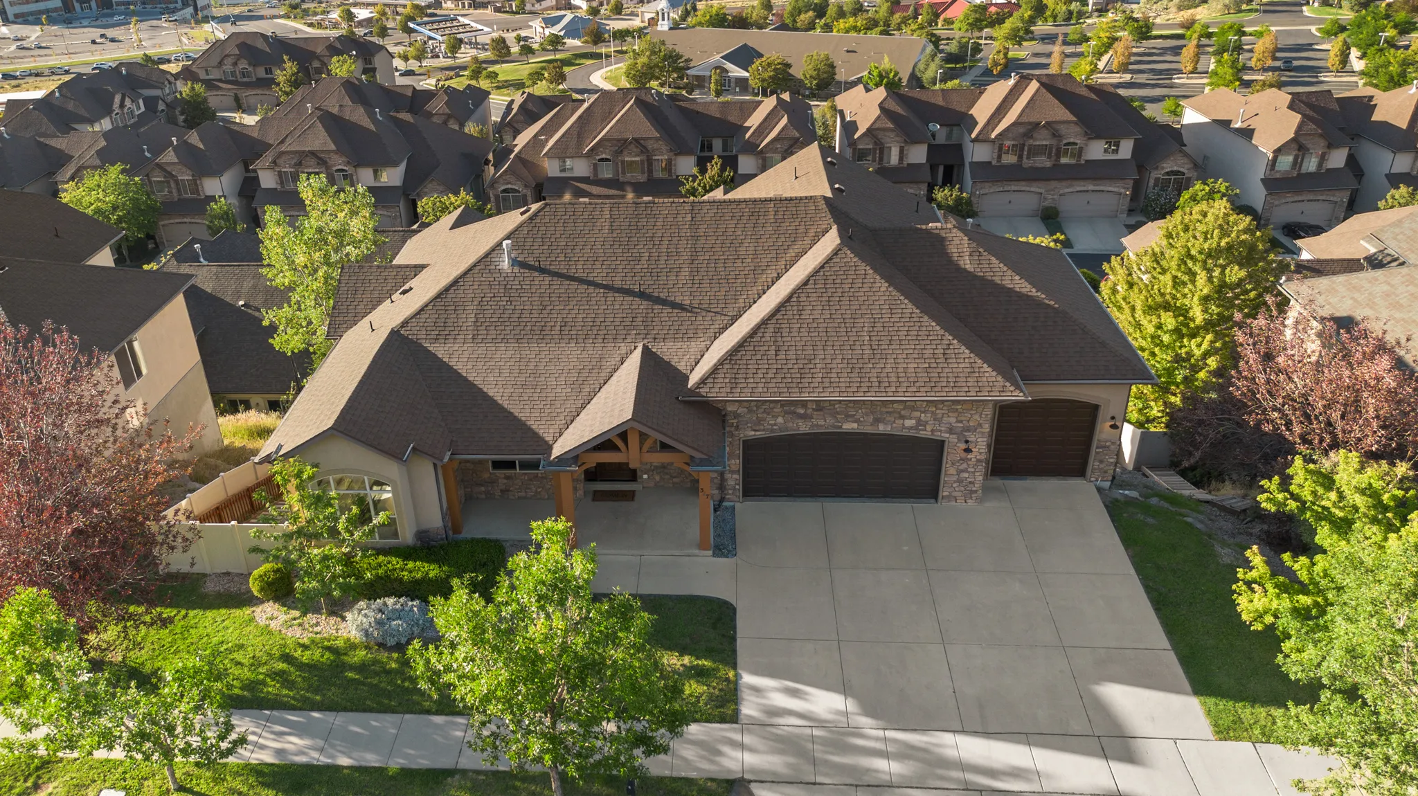 Stone and stucco exterior with a prominent gabled roof