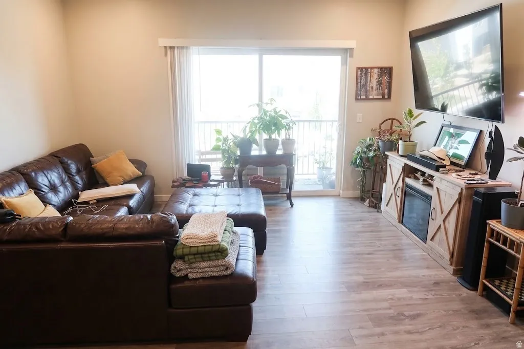 Wood-finish flooring throughout, complemented by light-toned wall paint
