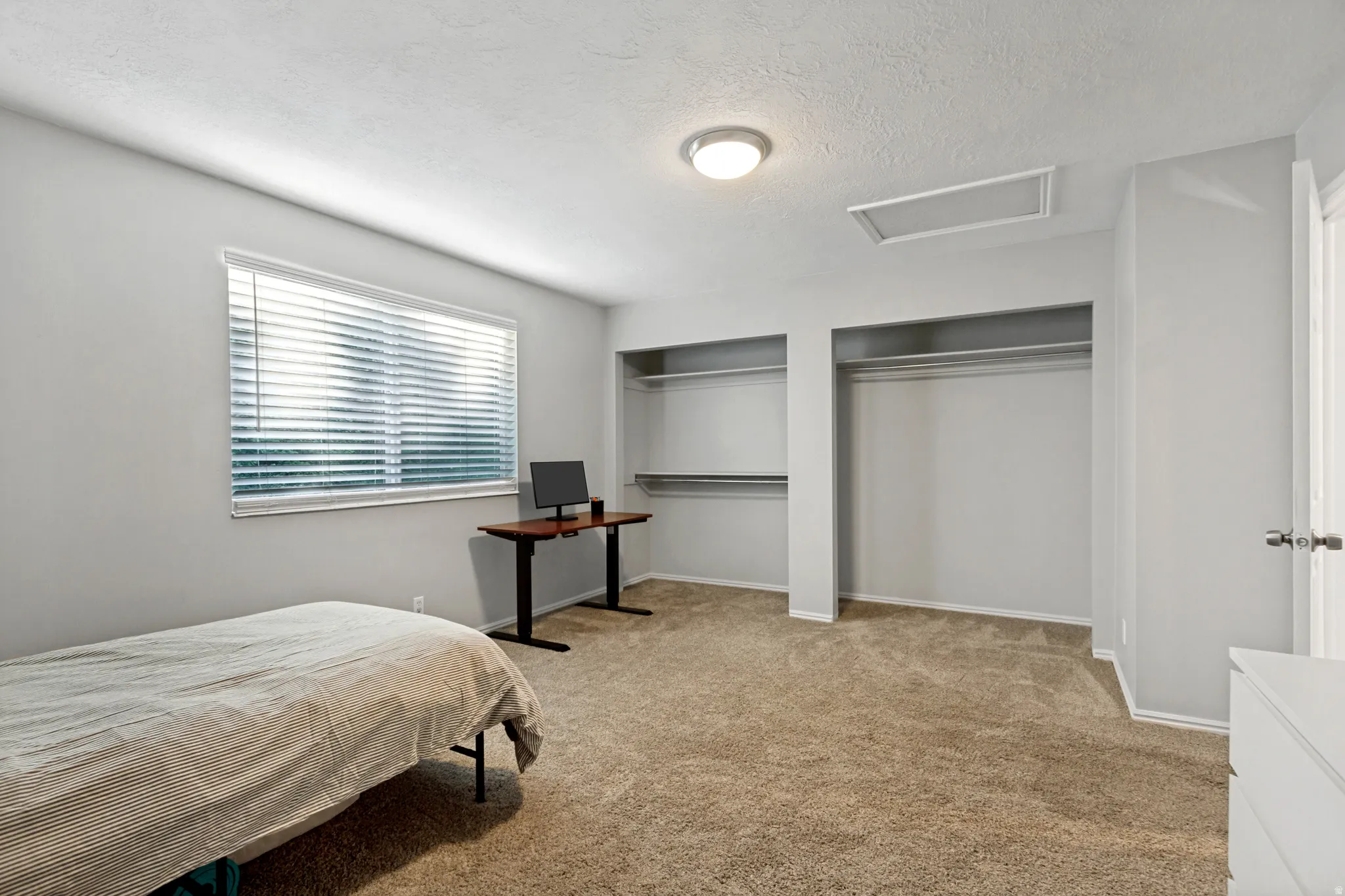Recessed open closets with shelving and hanging rods