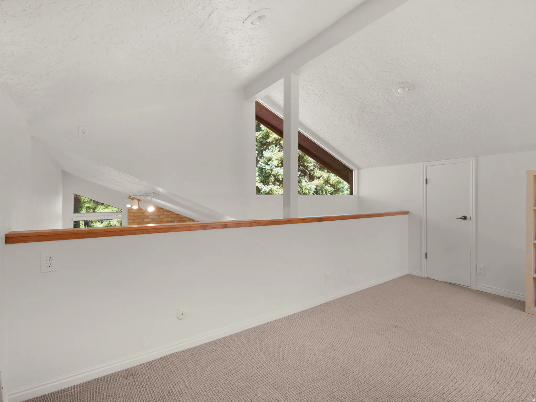 Loft has access to additional storage areas