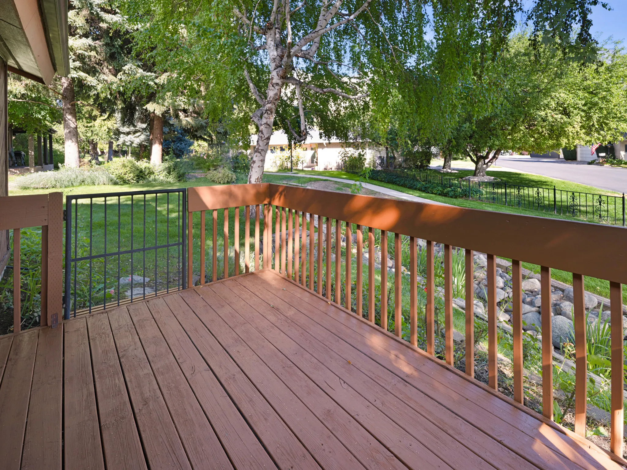 Deck with gate leads to tranquil common area