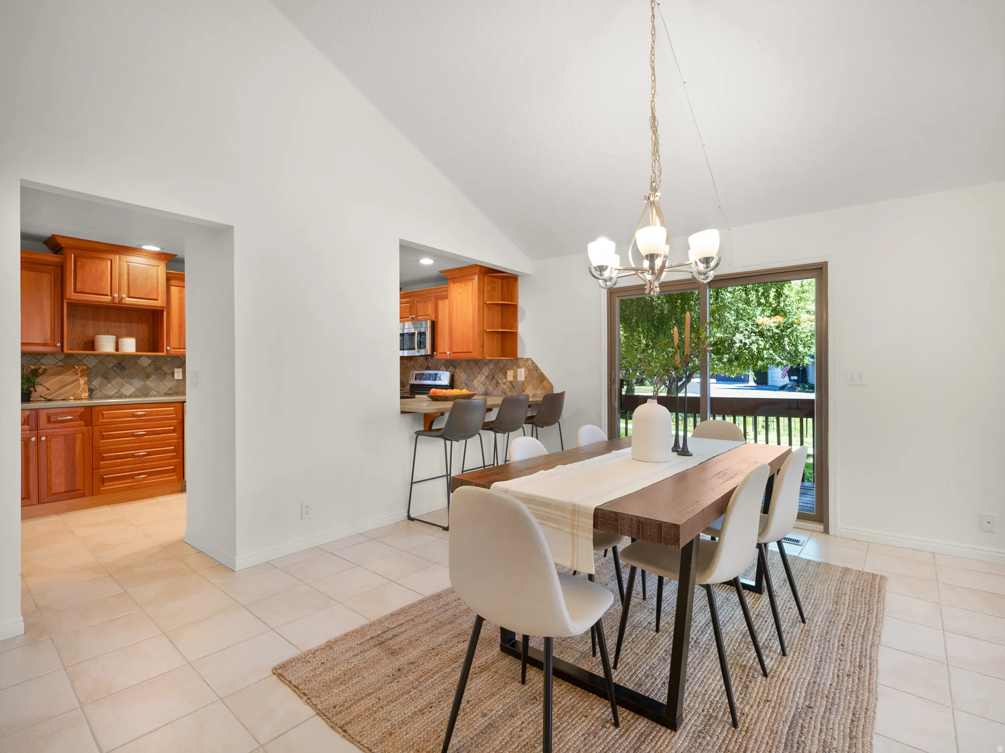 Dining room has sliding glass door to the deck