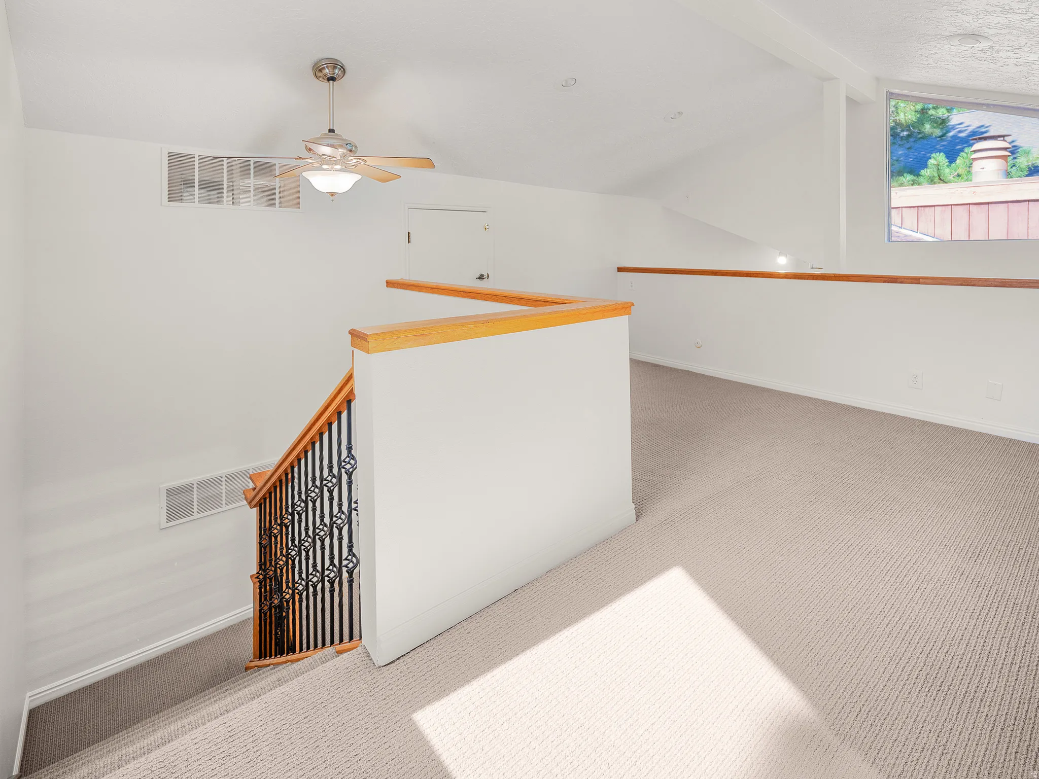 Loft space with vaulted ceilings