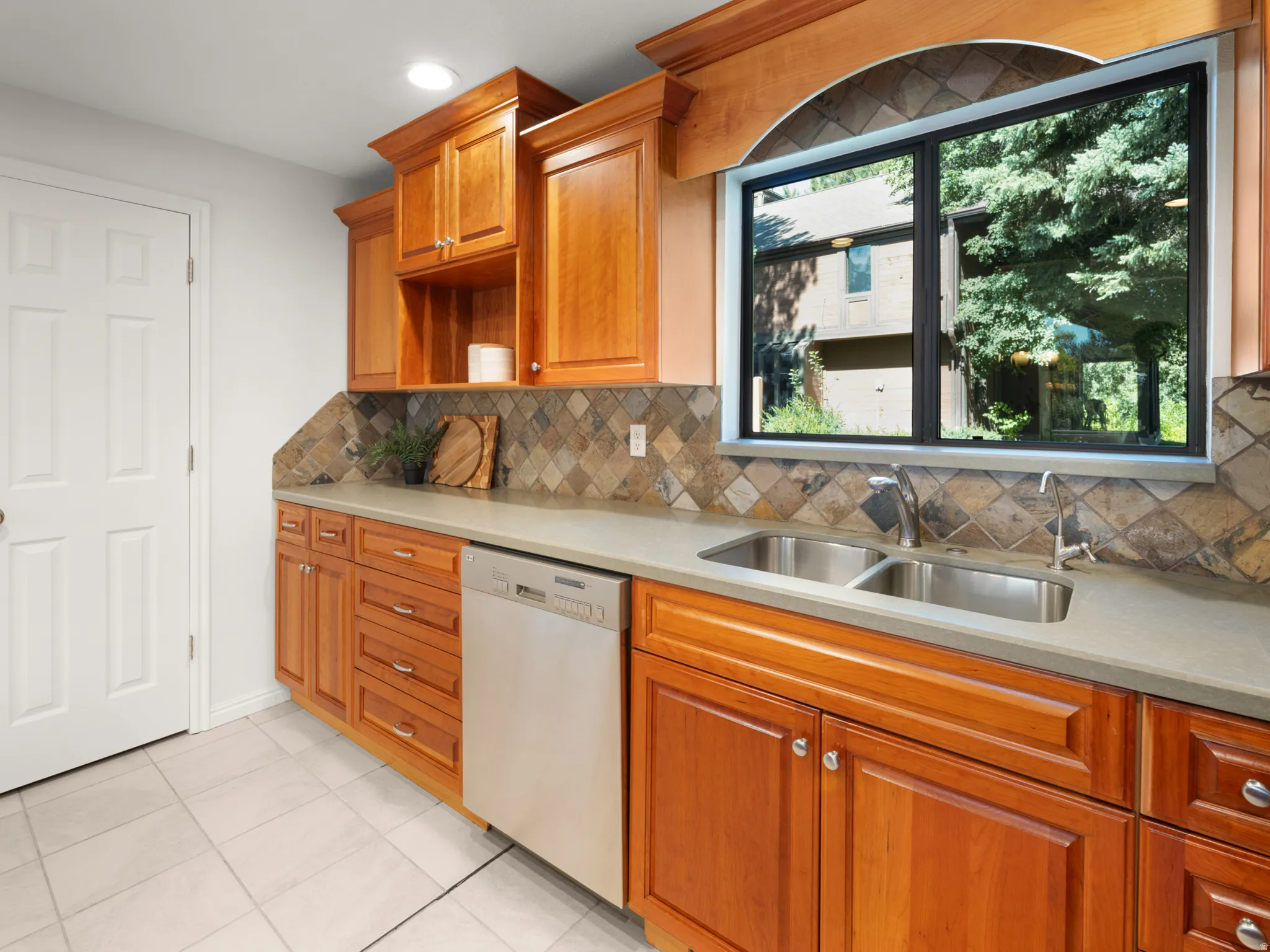 Kitchen has quartzite countertops