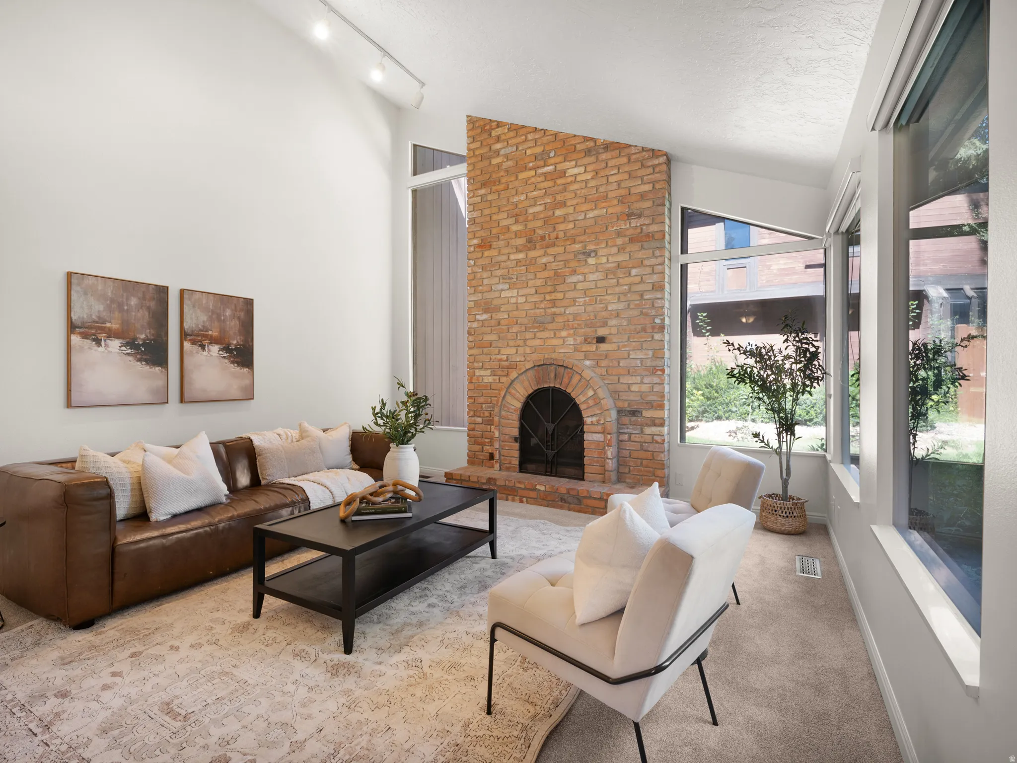 Floor-to-ceiling windows let in lots of natural light