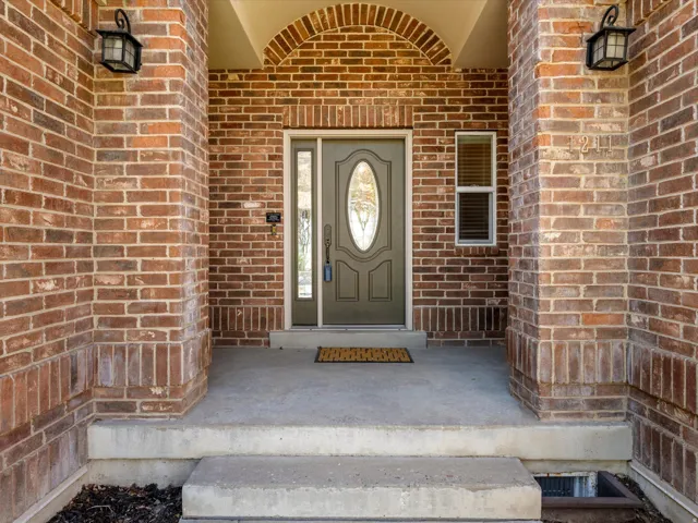 Brick exterior with an arched entryway