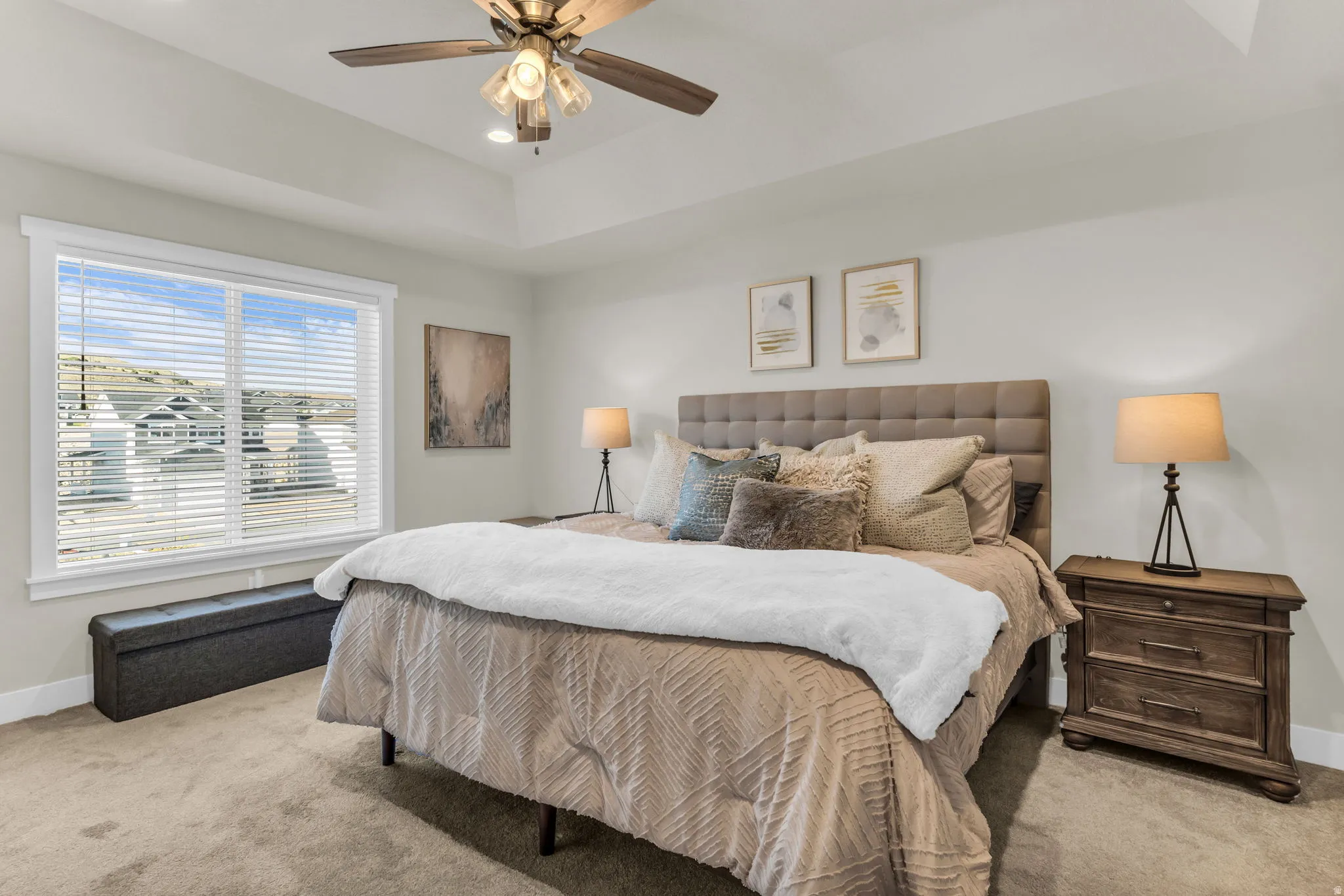 Tray ceiling with recessed lighting and a ceiling fan