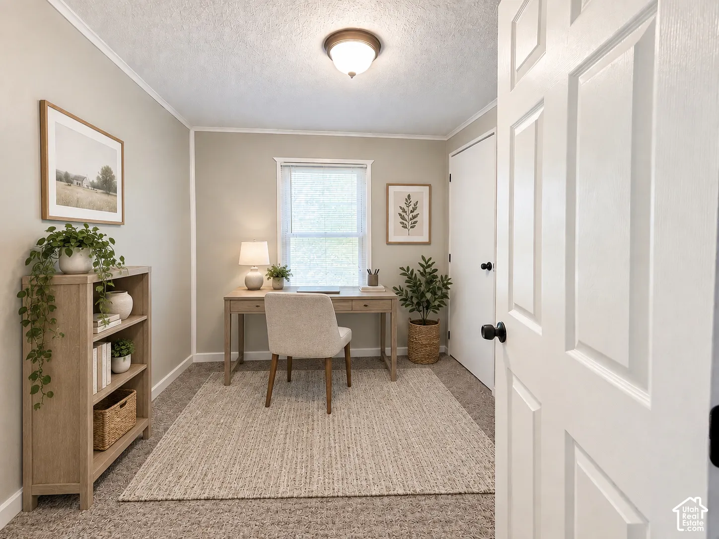 Carpeted flooring, crown molding, white trim, recessed window, and a built-in closet with panel doors